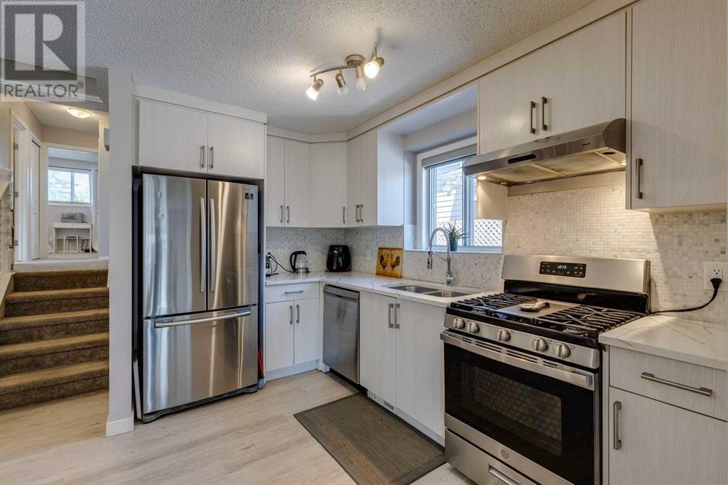 20 Tararidge Close Ne, Calgary, Alberta  T3J 2P7 - Photo 4 - A2200674