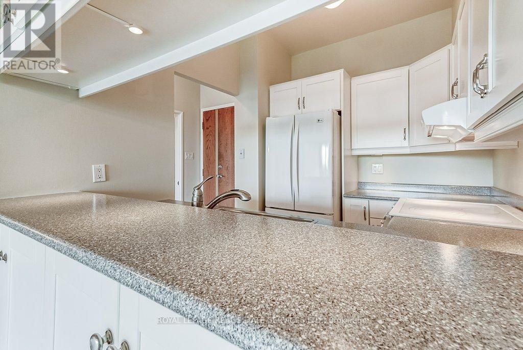 415 - 2511 Lakeshore Road W, Oakville, Ontario  L6L 6L9 - Photo 19 - W12093342