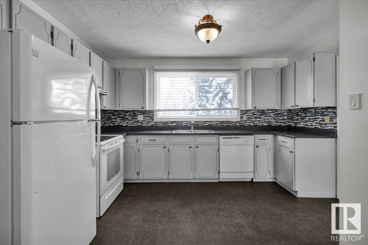 Property at 10935 34A AV NW image 4