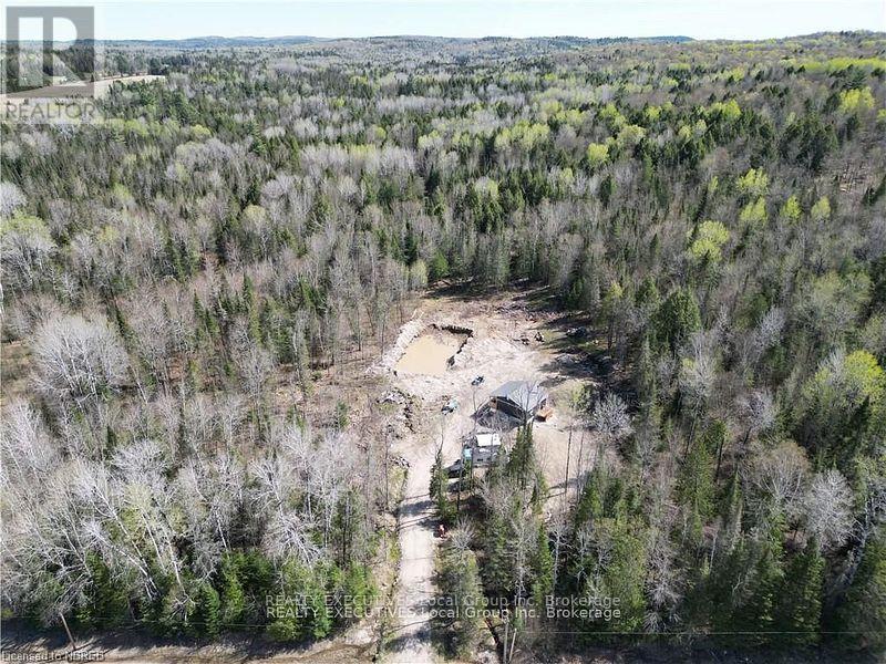 1348 Peddlers Drive, Calvin, Ontario  P0H 1V0 - Photo 6 - X12093463