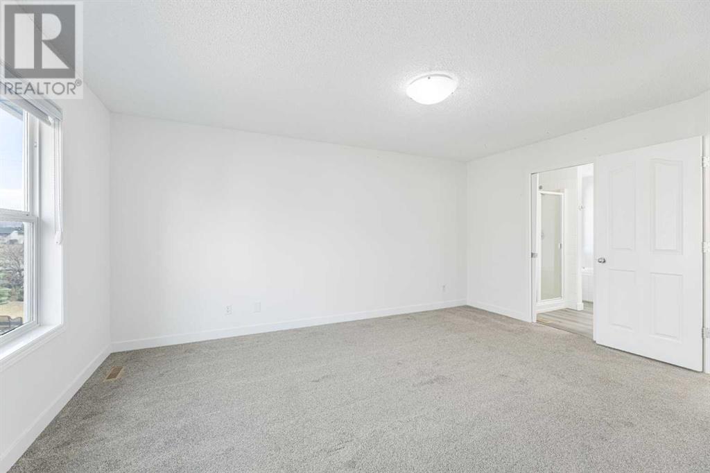 53 Strathlea Grove Sw, Calgary, Alberta  T3H 5C5 - Photo 24 - A2213324