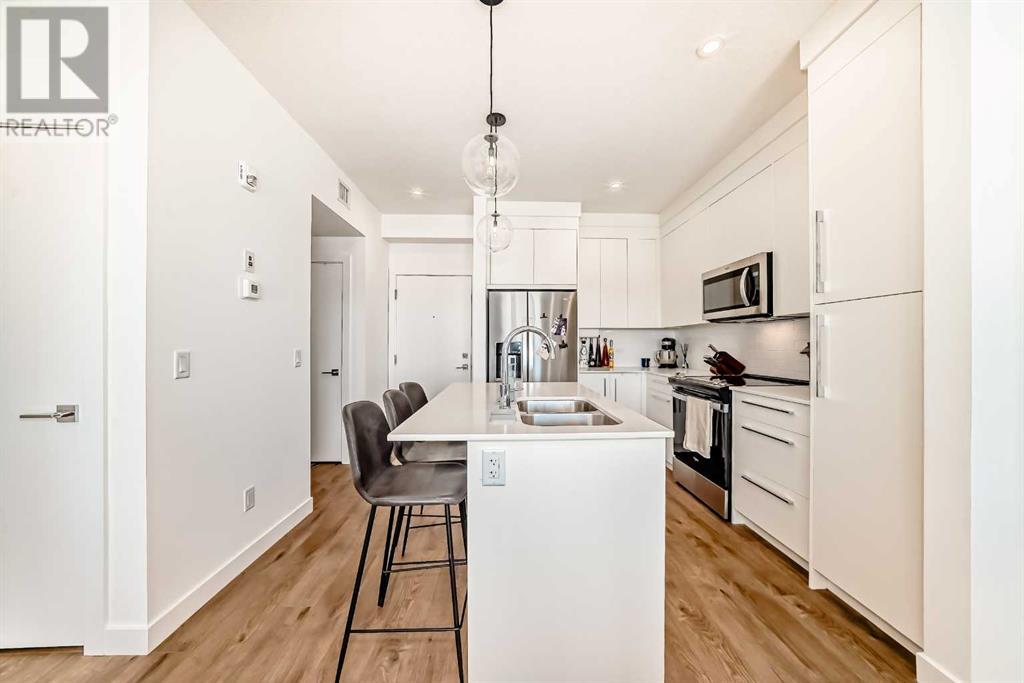 1311, 111 Wolf Creek Drive Se, Calgary, Alberta  T2X 5X2 - Photo 2 - A2213626