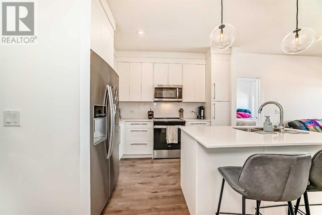 1311, 111 Wolf Creek Drive Se, Calgary, Alberta  T2X 5X2 - Photo 4 - A2213626