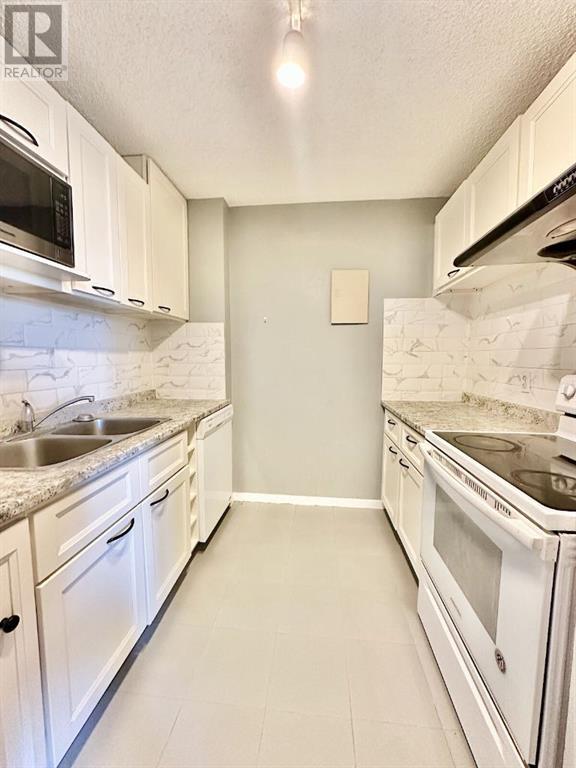 Property at 702, 4944 Dalton Drive NW image 2