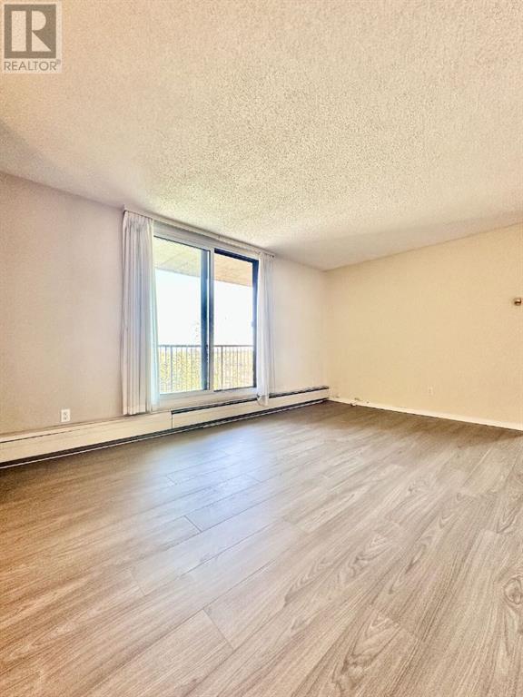 Property at 702, 4944 Dalton Drive NW image 4