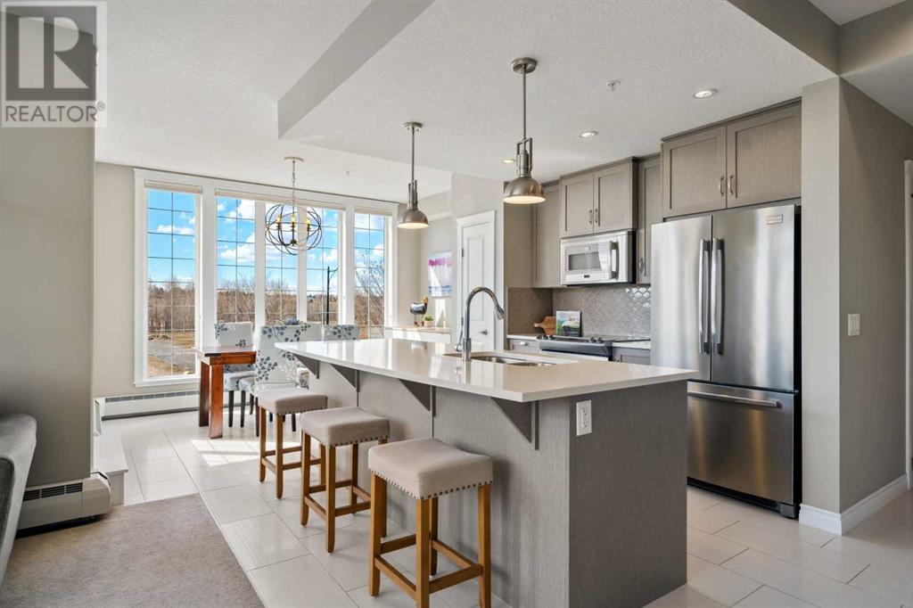203, 39 Quarry Gate Se, Calgary, Alberta  T2C 4K6 - Photo 6 - A2210497