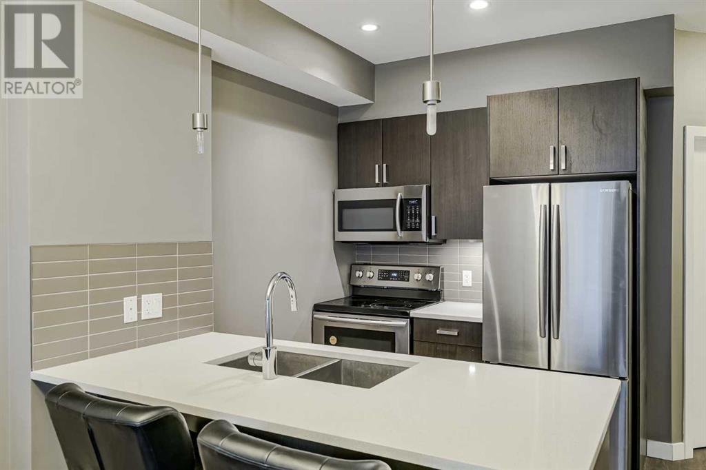 113, 22 Auburn Bay Link Se, Calgary, Alberta  T3M 1Z8 - Photo 2 - A2210341