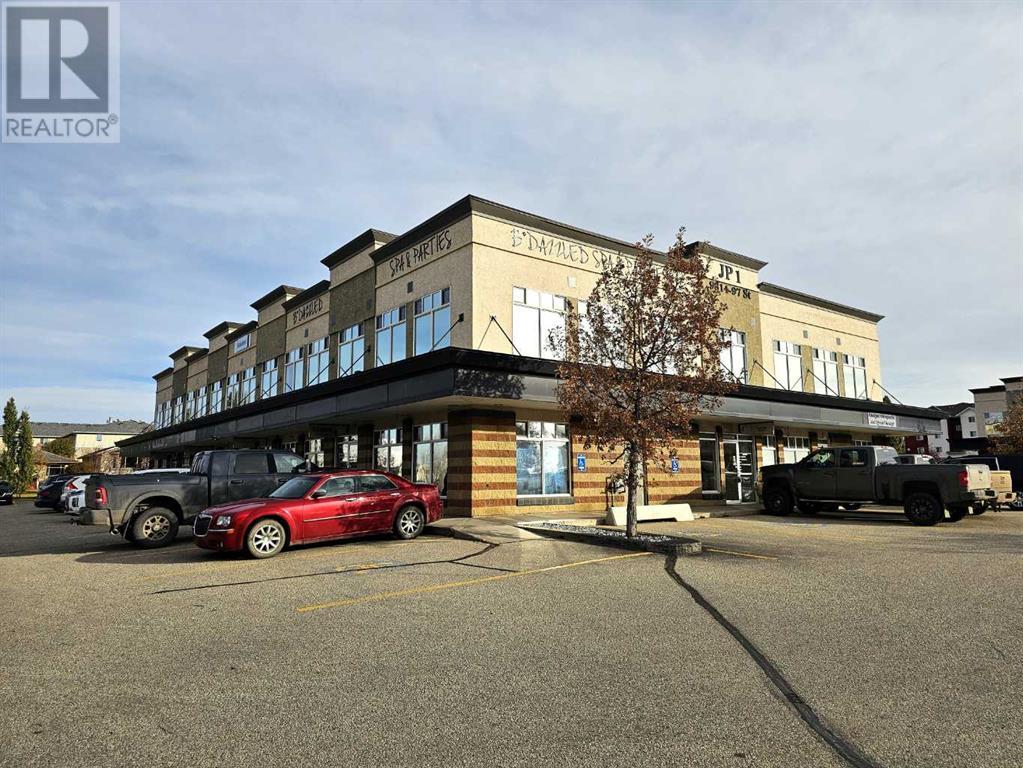 202, 9814 97 Street, Grande Prairie, Alberta  T8V 8H5 - Photo 1 - A2211003