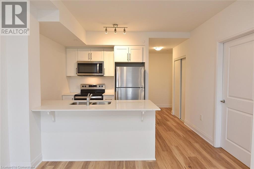 1936 Rymal Road E Unit# 211, Hamilton, Ontario  L0R 1P0 - Photo 14 - 40716135