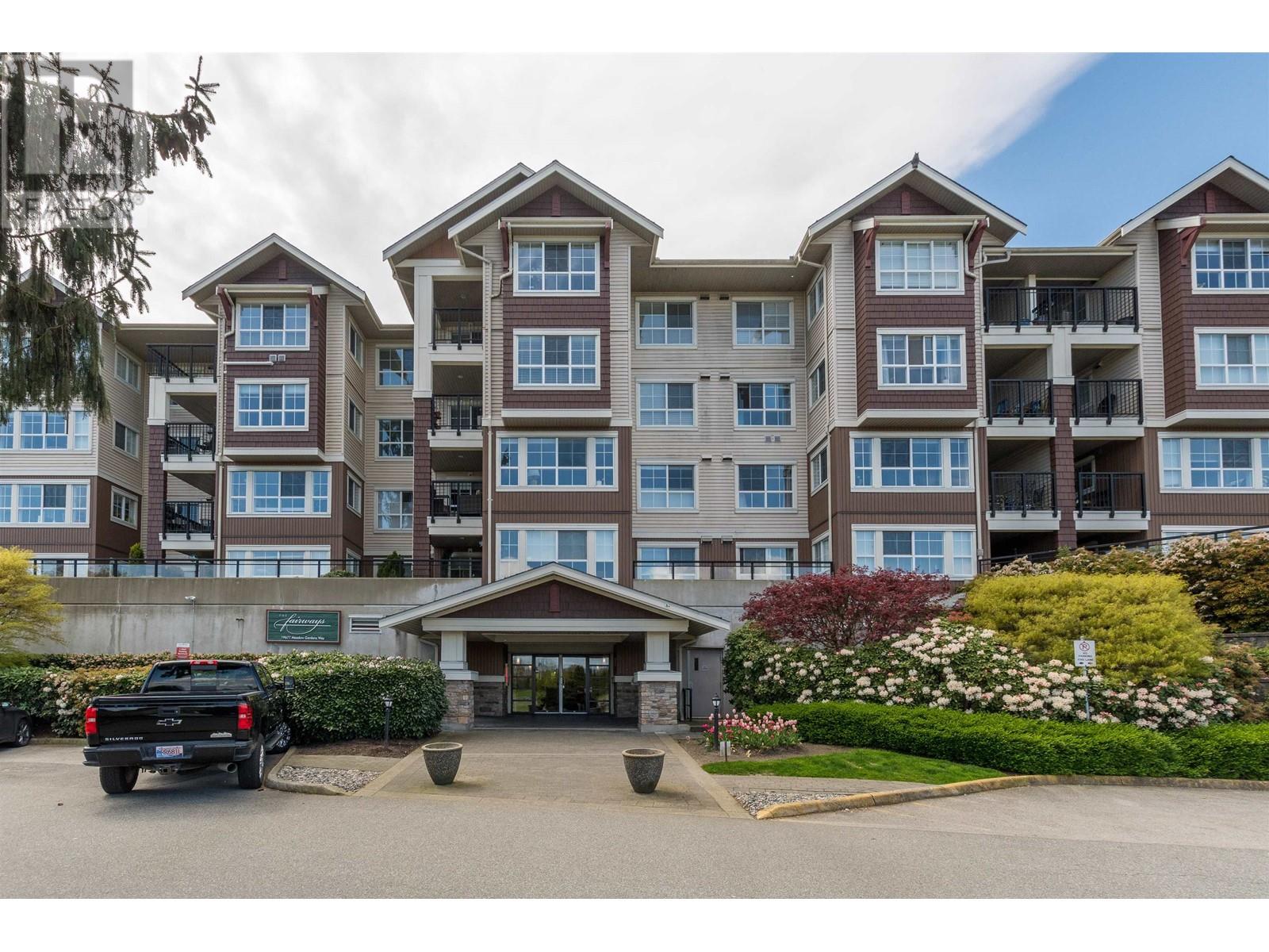 423 19677 Meadow Gardens Way, Pitt Meadows, British Columbia  V3Y 0A2 - Photo 1 - R2992558