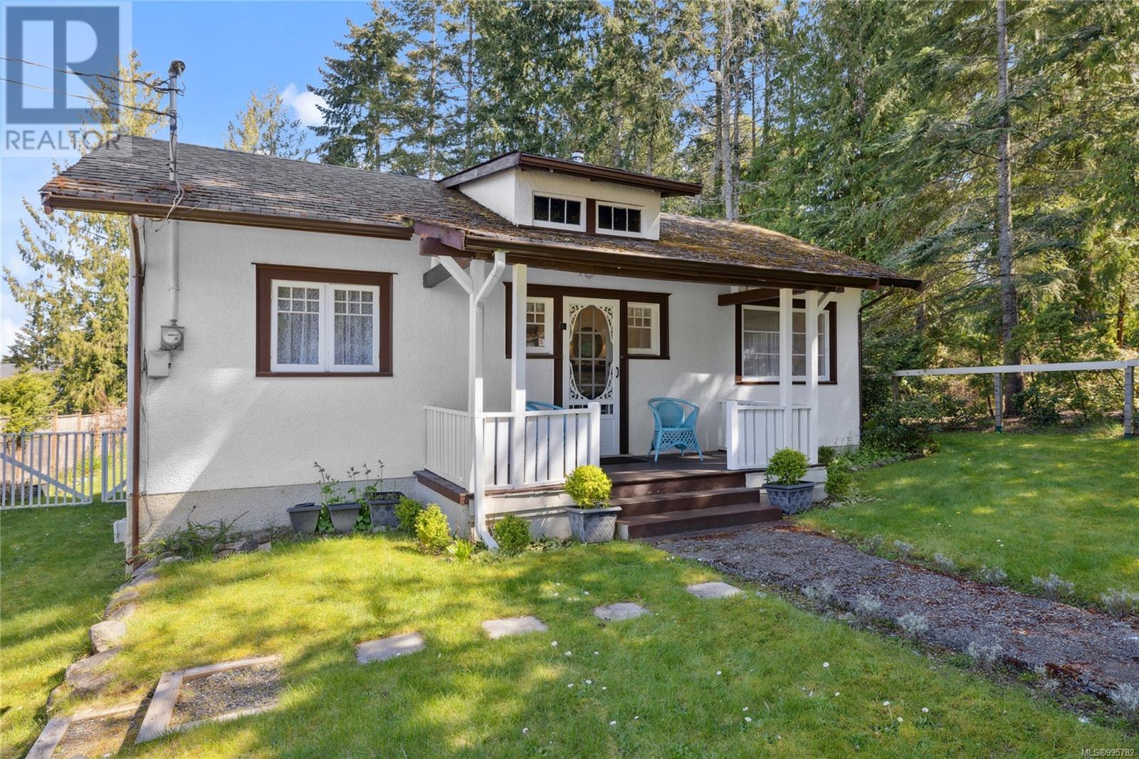634 Jones St, Qualicum Beach, British Columbia  V9K 1H2 - Photo 1 - 995782