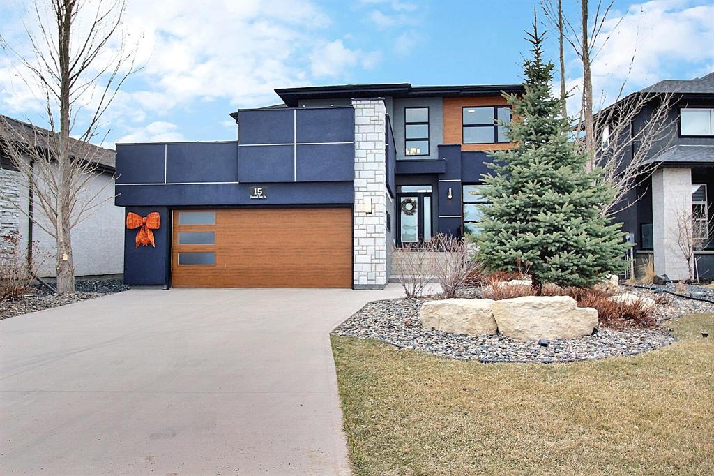15 Diamond Dust Drive Winnipeg, Manitoba 2K//Winnipeg/WELCOME HOME to this amazing 1882 sq ft, 3 bedroom, 3.5 bath former AVANTI custom showhome! This home features a main floor dining/flex room, beautiful family room with 18 foot ceilings, gas fireplace and tons of natural light. Stunning eat-in kitchen with quartz countertops, tile backsplash, under mount sink, SS appliances and a walk through pantry! Main floor mudroom with laundry as well. The upper level features 3 bedrooms and deluxe master ensuite with heated tile floors, dual sinks, quartz top vanity, and a glass/tile shower. The fully finished lower level is perfect for entertaining family and friends and features a dining/lounge area, games area with pool table, wet bar, recroom, 3 piece bath and a gym room. The landscaped backyard features a composite deck plus patio and plenty of room for you to enjoy. Close to schools and of course everything that the community of Sage Creek has to offer! Call to see it today! (id:48254)