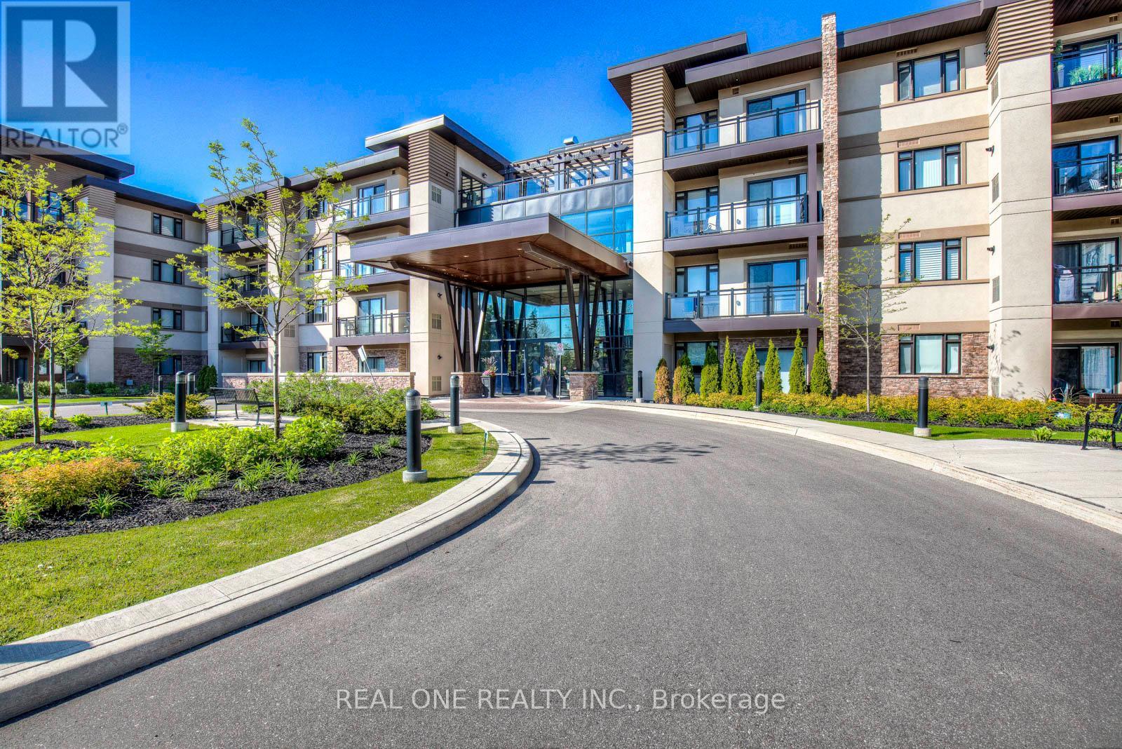 321 - 128 Garden Drive, Oakville, Ontario  L6K 2W5 - Photo 2 - W12097788