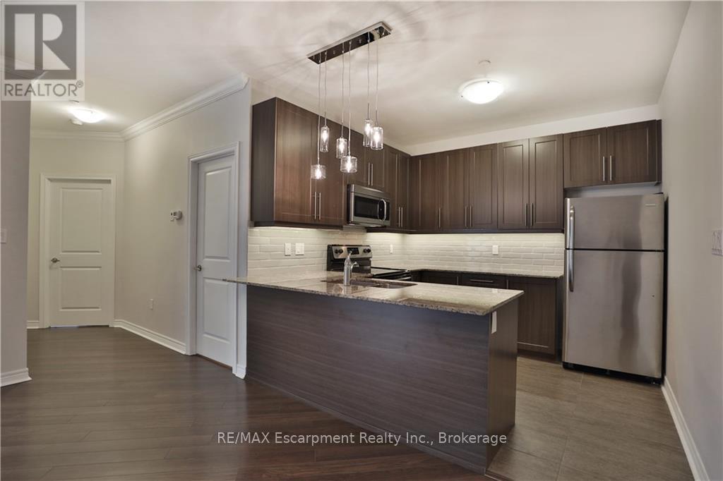 623 - 33 Whitmer Street, Milton, Ontario  L9T 8P9 - Photo 3 - W12028314
