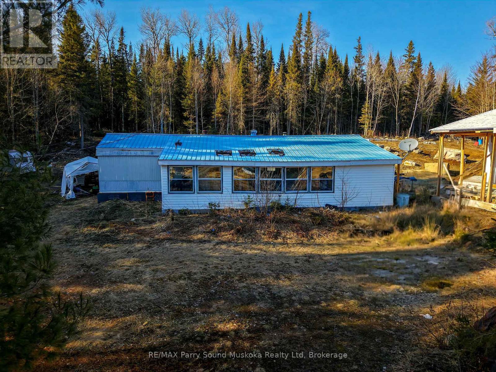556 Highway 518 W, Perry, Ontario  P0A 1J0 - Photo 16 - X12084053