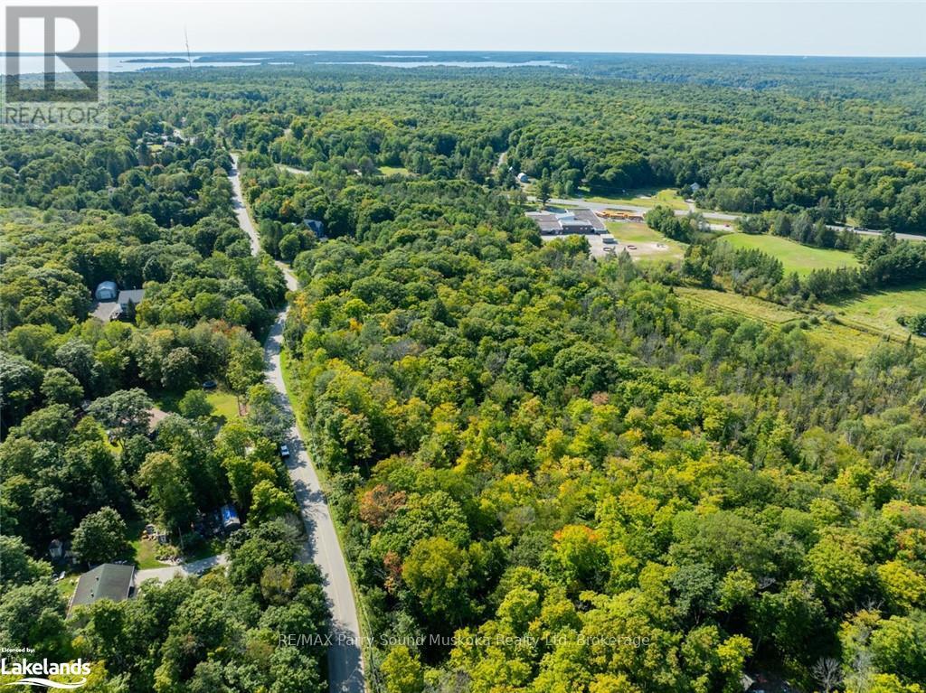18 Burnside Bridge Road, Mcdougall, Ontario  P2A 2W9 - Photo 2 - X12099746
