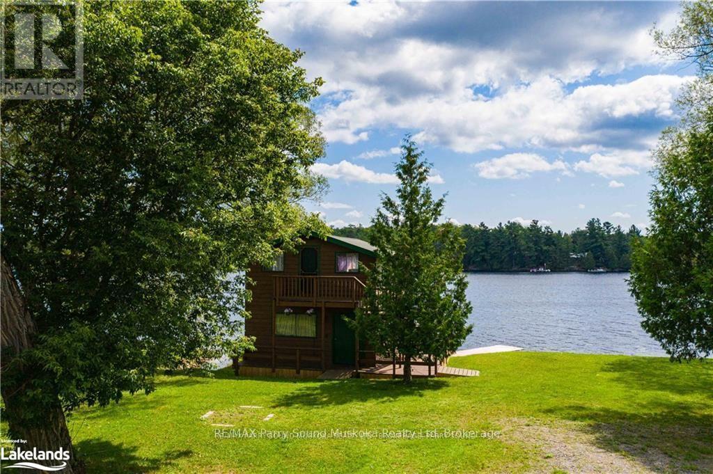 2235 Hwy 124, Whitestone, Ontario  P0A 1G0 - Photo 12 - X12100008