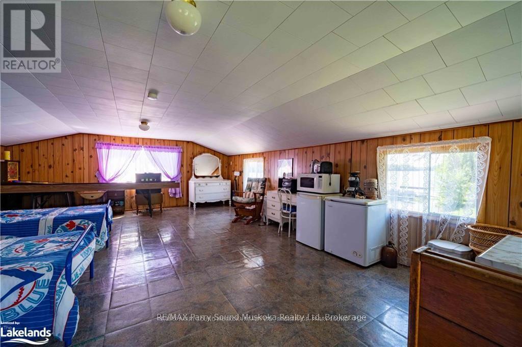 2235 Hwy 124, Whitestone, Ontario  P0A 1G0 - Photo 22 - X12100008
