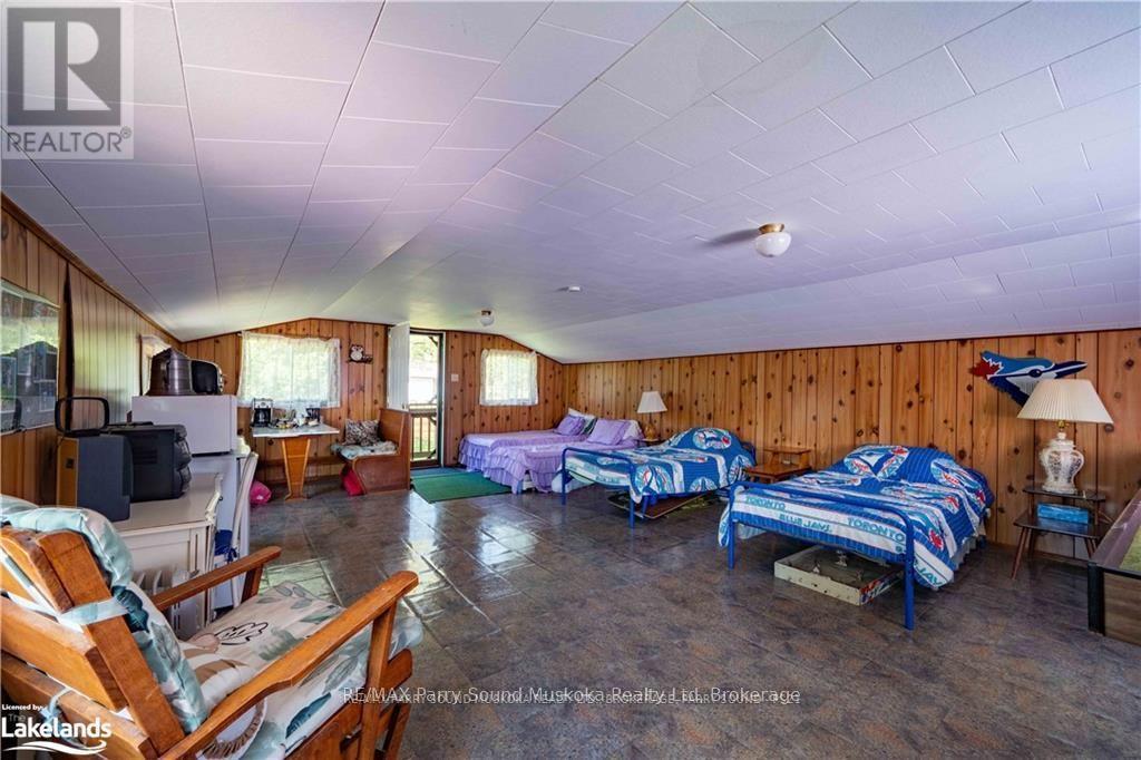 2235 Hwy 124, Whitestone, Ontario  P0A 1G0 - Photo 23 - X12100008