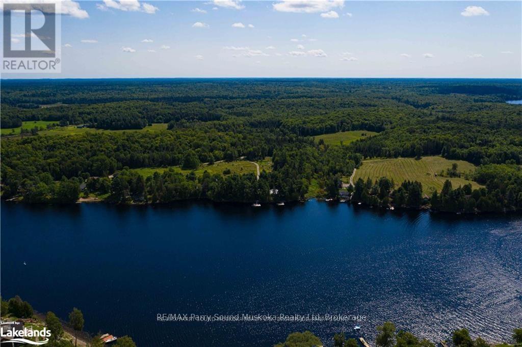2235 Hwy 124, Whitestone, Ontario  P0A 1G0 - Photo 3 - X12100008