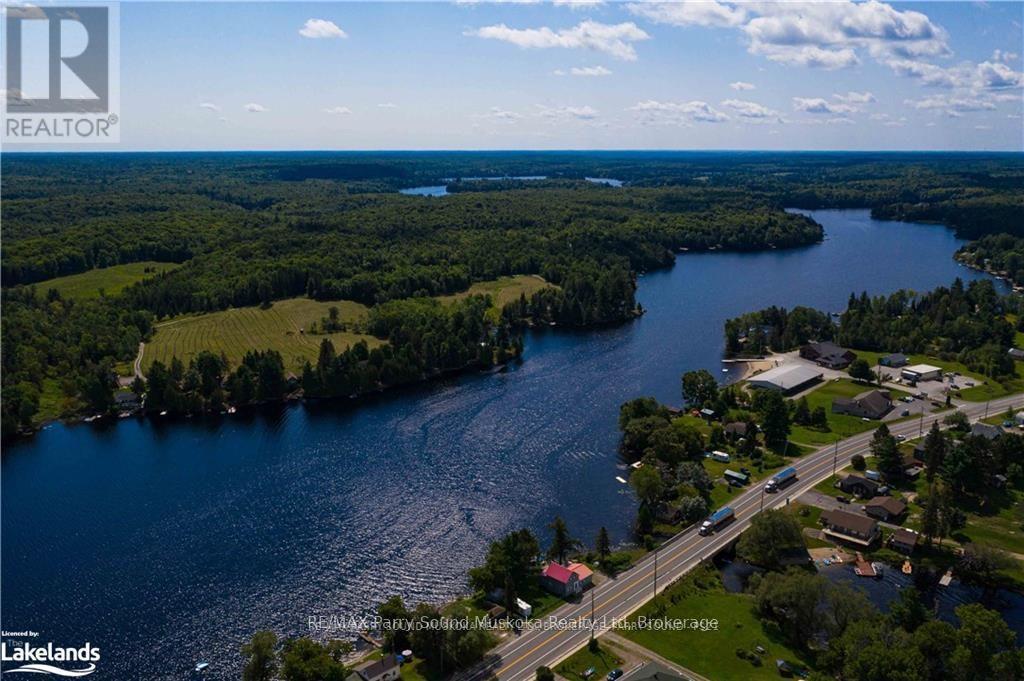 2235 Hwy 124, Whitestone, Ontario  P0A 1G0 - Photo 4 - X12100008