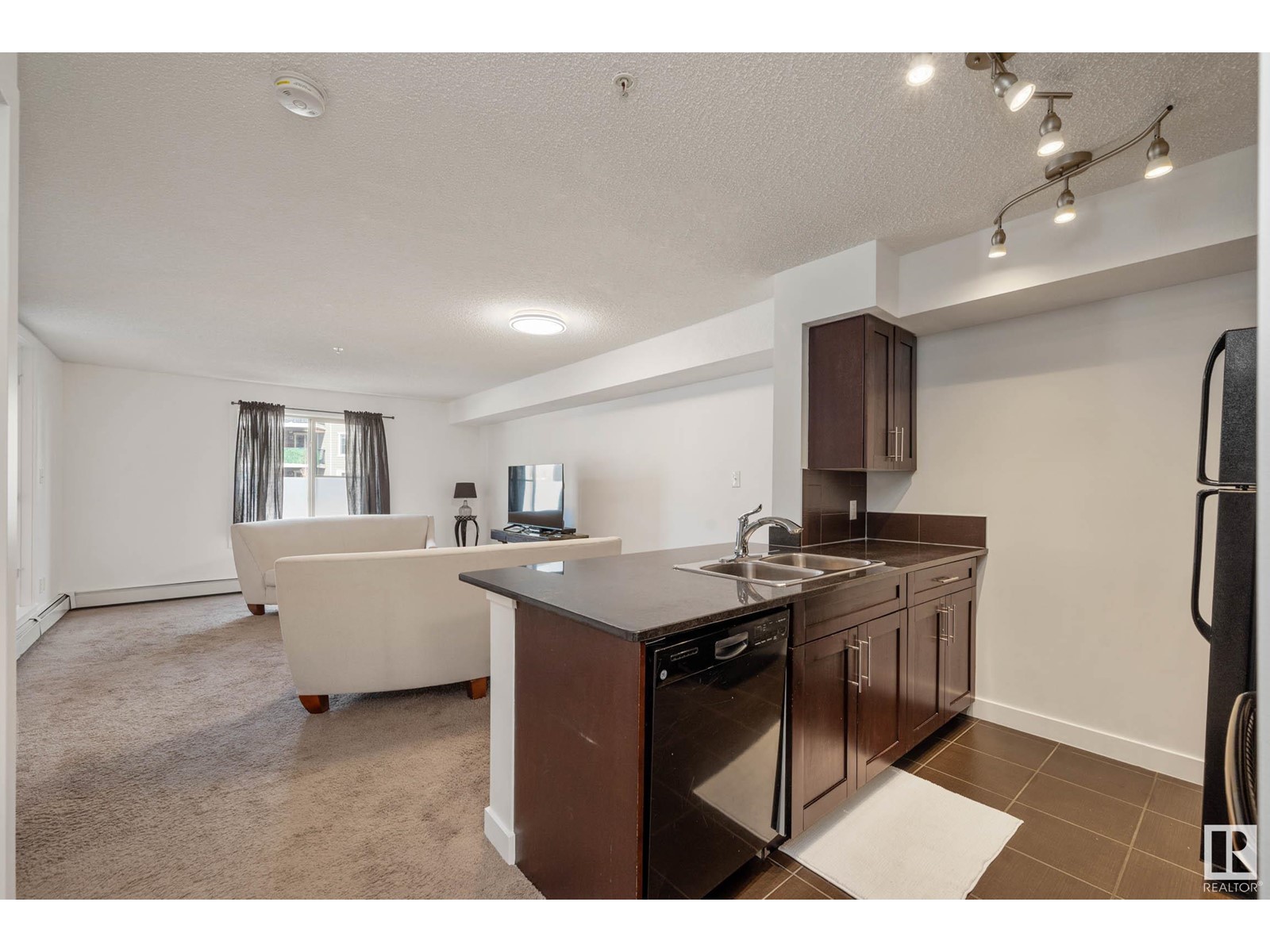 Property at #107 1080 MCCONACHIE BV NW image 5