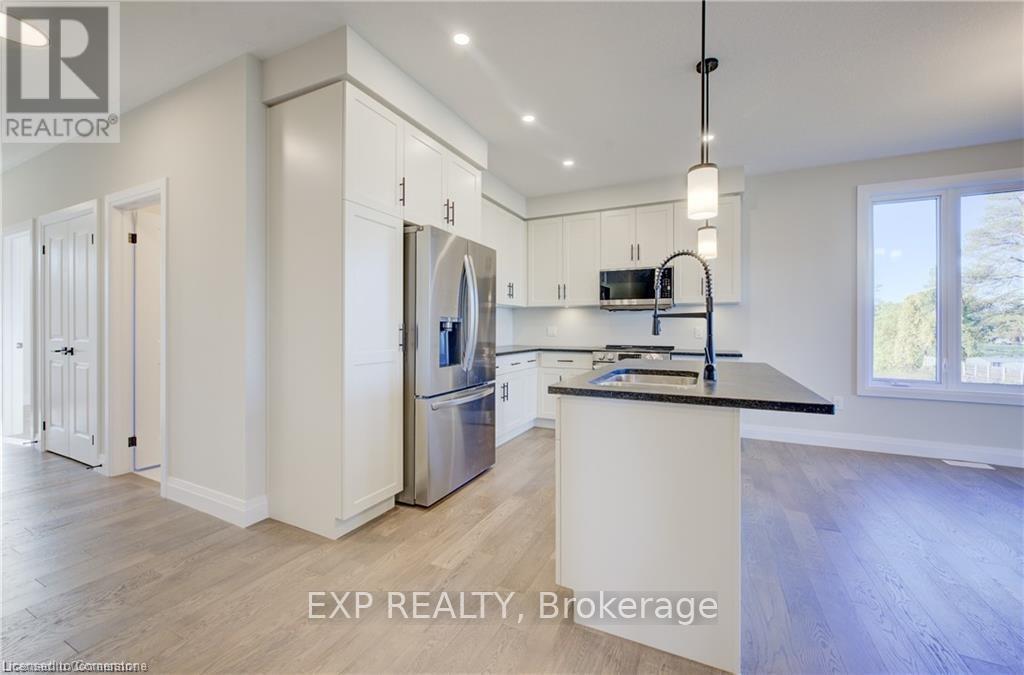 113 Bean Street, Minto, Ontario  N0G 1Z0 - Photo 6 - X12100176