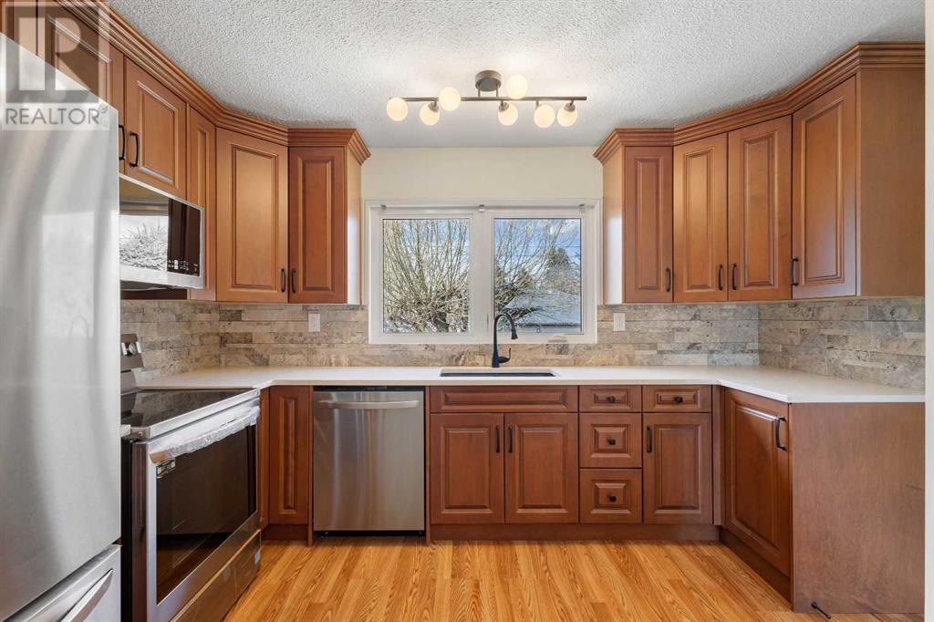 Property at 7419 Huntertown Crescent NW image 3