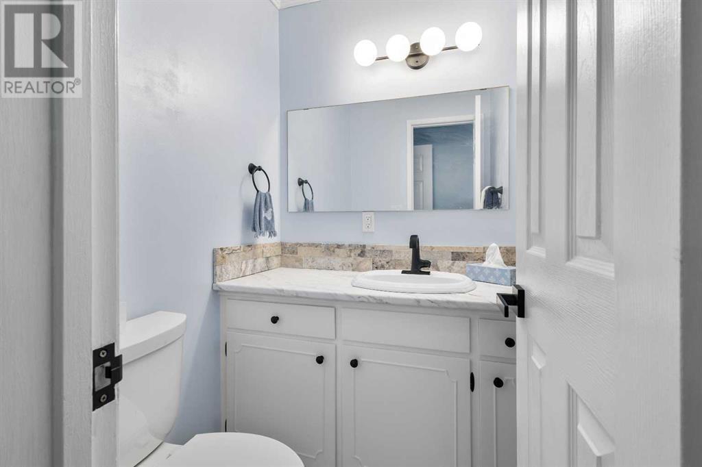 7419 Huntertown Crescent Nw, Calgary, Alberta  T2K 4K3 - Photo 18 - A2212704