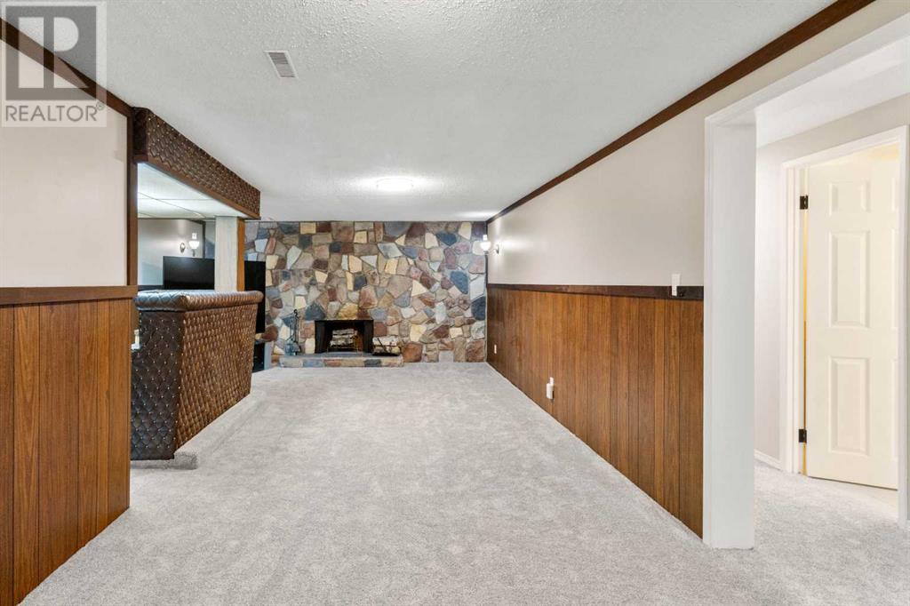 7419 Huntertown Crescent Nw, Calgary, Alberta  T2K 4K3 - Photo 26 - A2212704