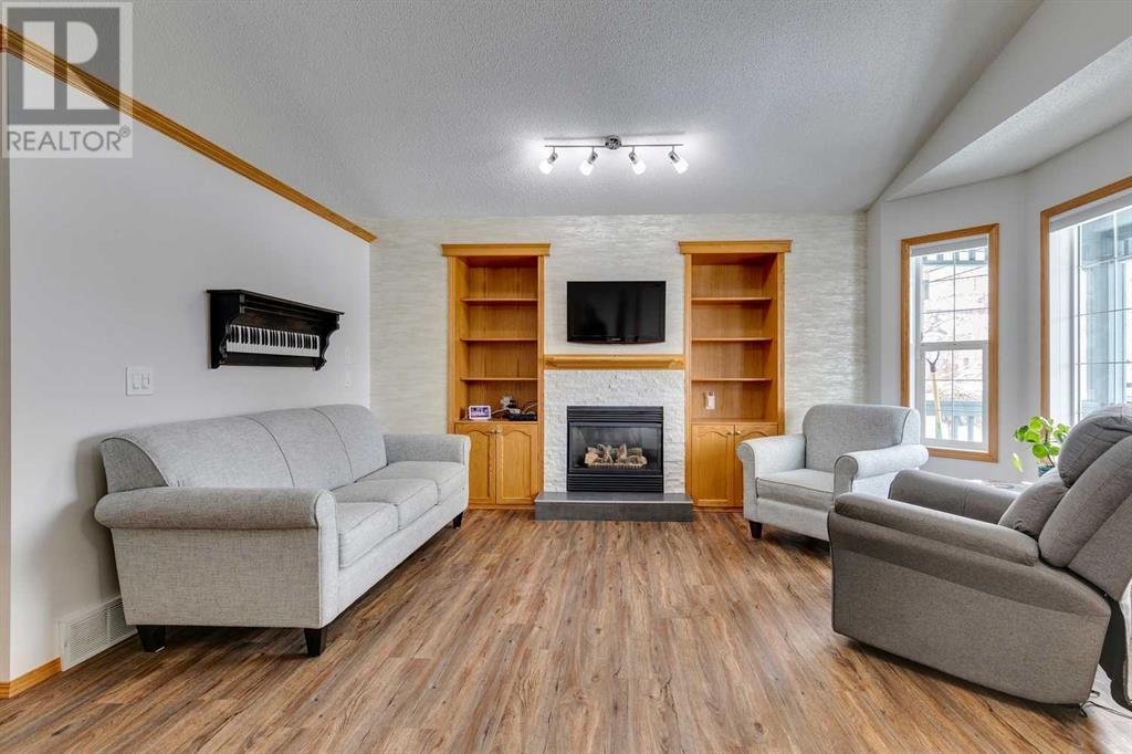 711 Sheep River Court, Okotoks, Alberta  T1S 1T8 - Photo 3 - A2211640