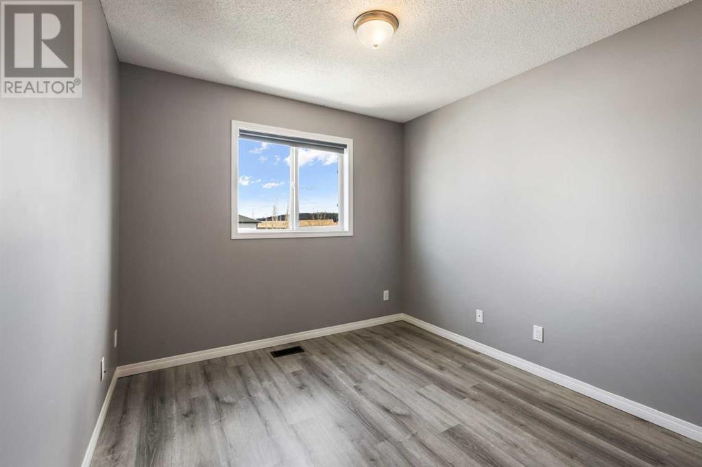 56 Cimarron Grove Way, Okotoks, Alberta  T1S 2L9 - Photo 16 - A2213505