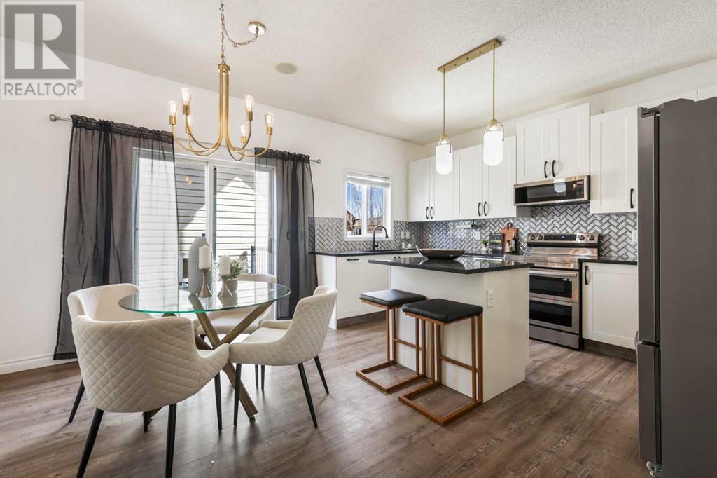56 Cimarron Grove Way, Okotoks, Alberta  T1S 2L9 - Photo 6 - A2213505