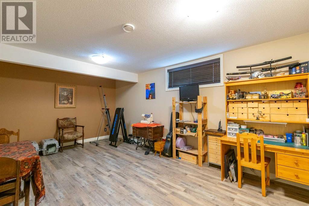 6611 40 Avenue, Stettler, Alberta  T4K 1L5 - Photo 38 - A2213130