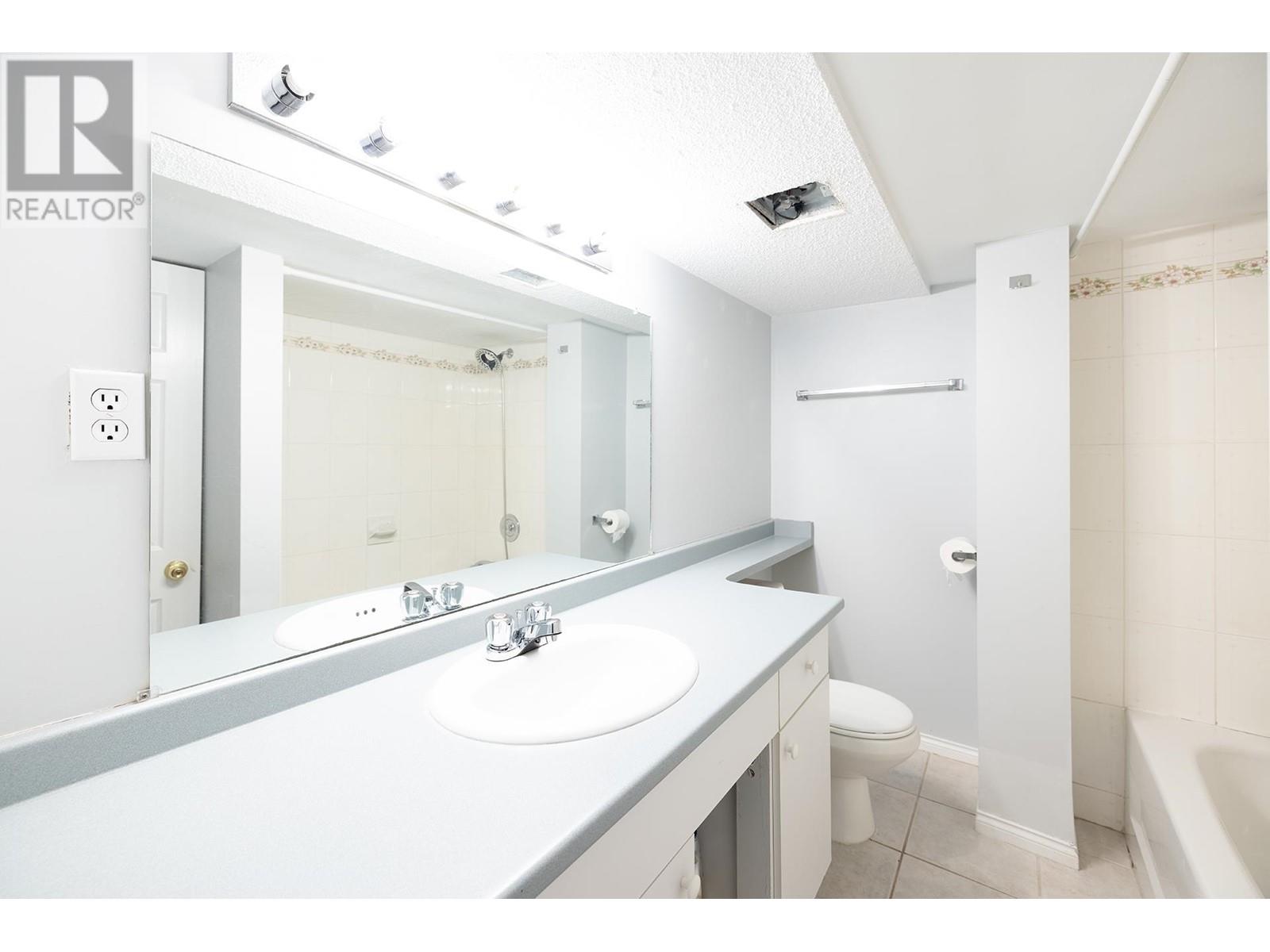 Basement 153x W 64th Avenue, Vancouver, British Columbia  V6P 2N8 - Photo 1 - R2994251