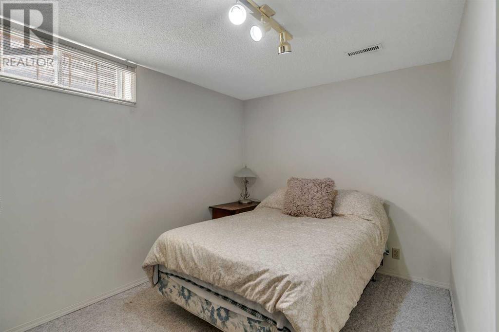 107 Parkland Hill Se, Calgary, Alberta  T2J 4K4 - Photo 23 - A2213310