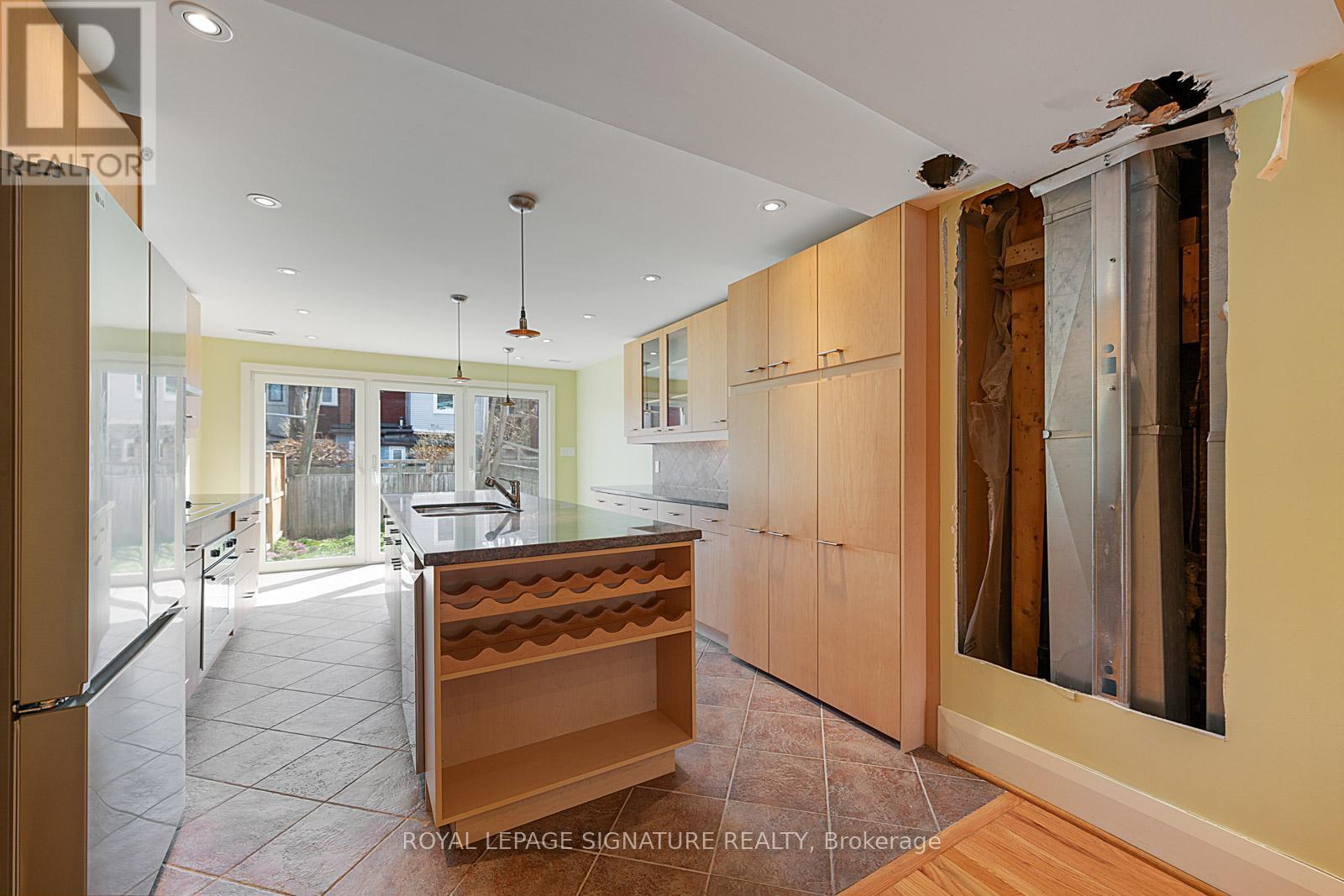 99 Kent Road, Toronto (Greenwood-Coxwell), Ontario  M4L 2X5 - Photo 13 - E12102323