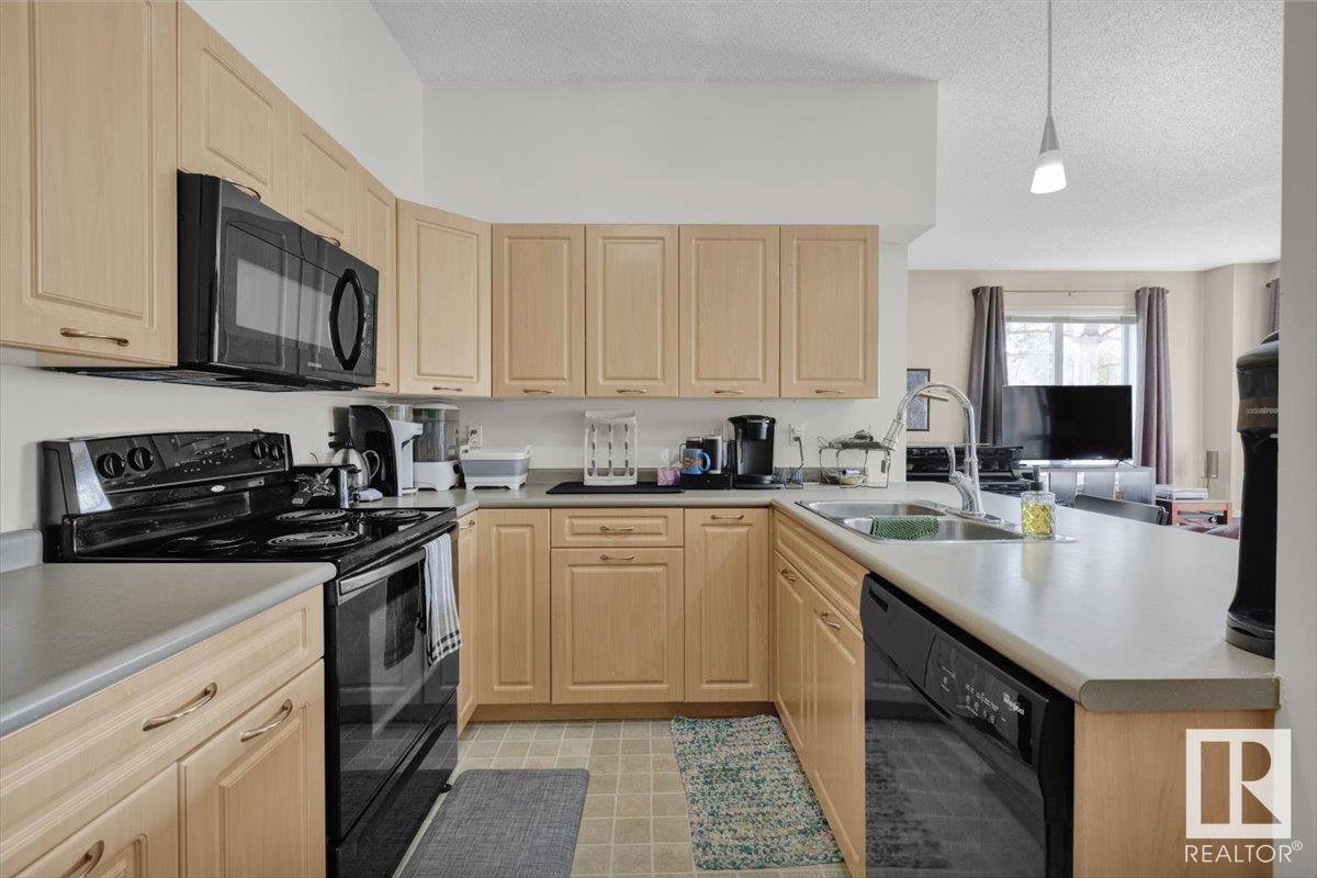 Property at #110 6315 135 AV NW image 2