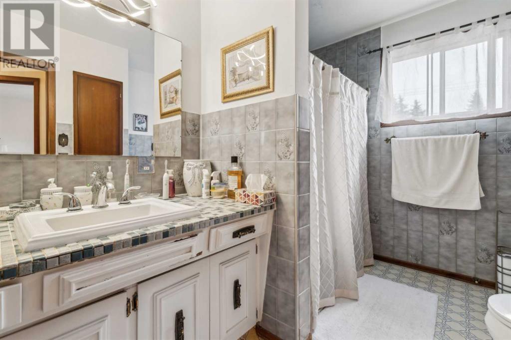 11 Gissing Drive Sw, Calgary, Alberta  T3E 4V6 - Photo 25 - A2201974