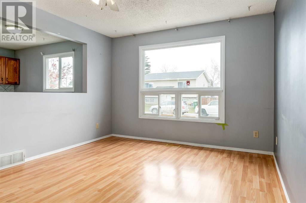 52 Abingdon Road Ne, Calgary, Alberta  T2A 6X6 - Photo 4 - A2211171