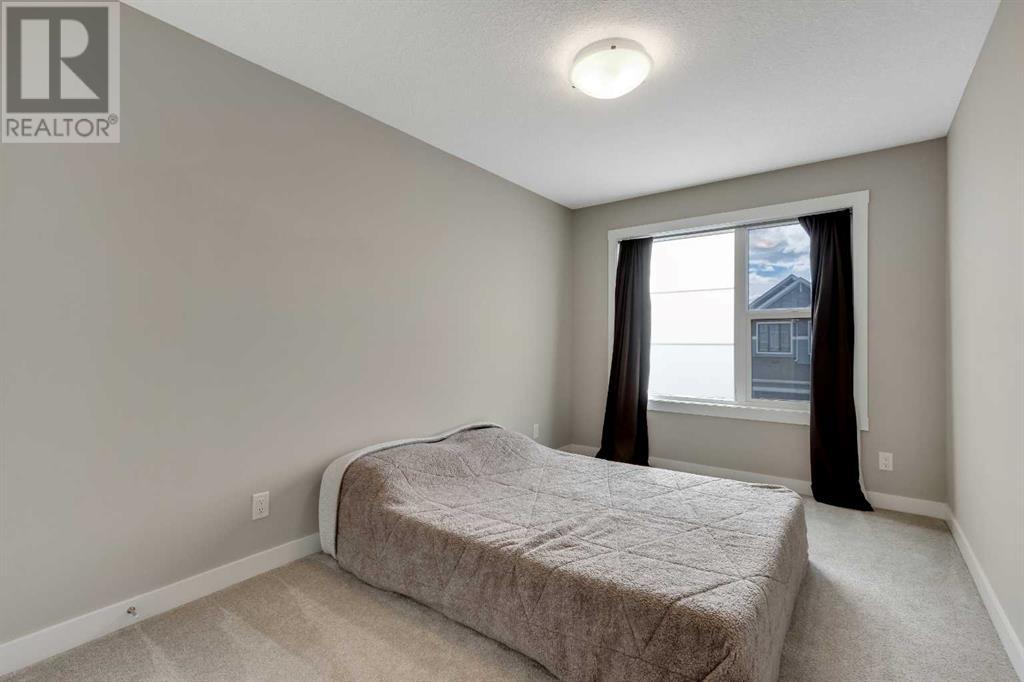 216 Creekstone Row Sw, Calgary, Alberta  T2X 4Y5 - Photo 19 - A2214962
