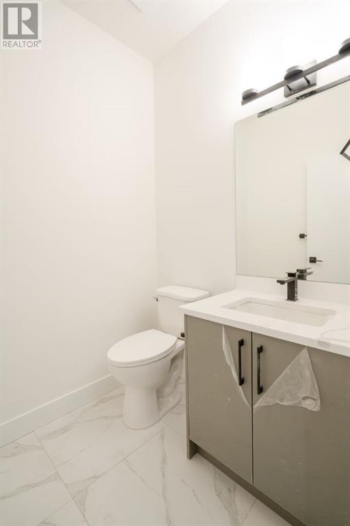 63, 59, 55, 51, 47 Baysprings Terrace Sw, Airdrie, Alberta  T4B 4a8 - Photo 9 - A2213068