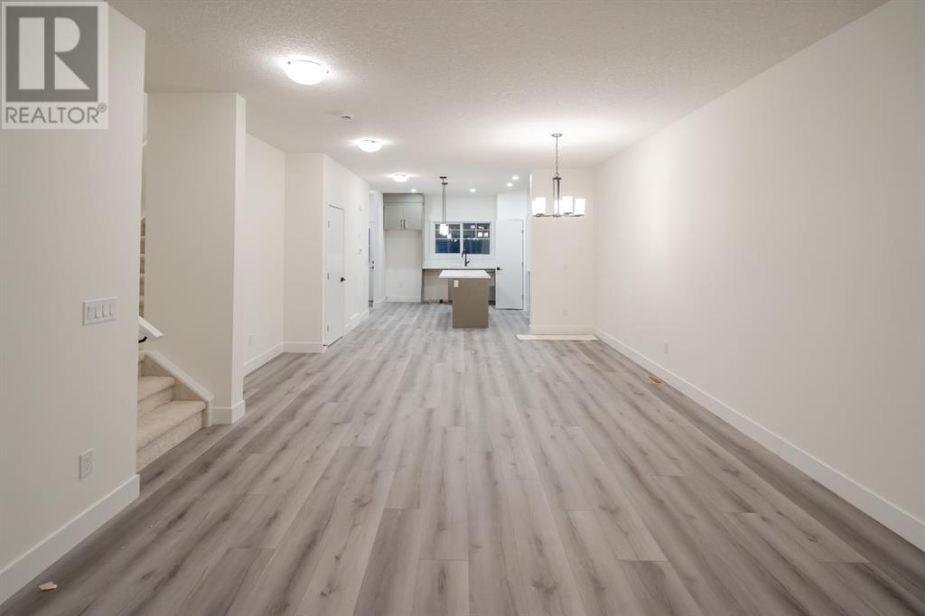 63, 59, 55, 51, 47 Baysprings Terrace Sw, Airdrie, Alberta  T4B 4a8 - Photo 6 - A2213068