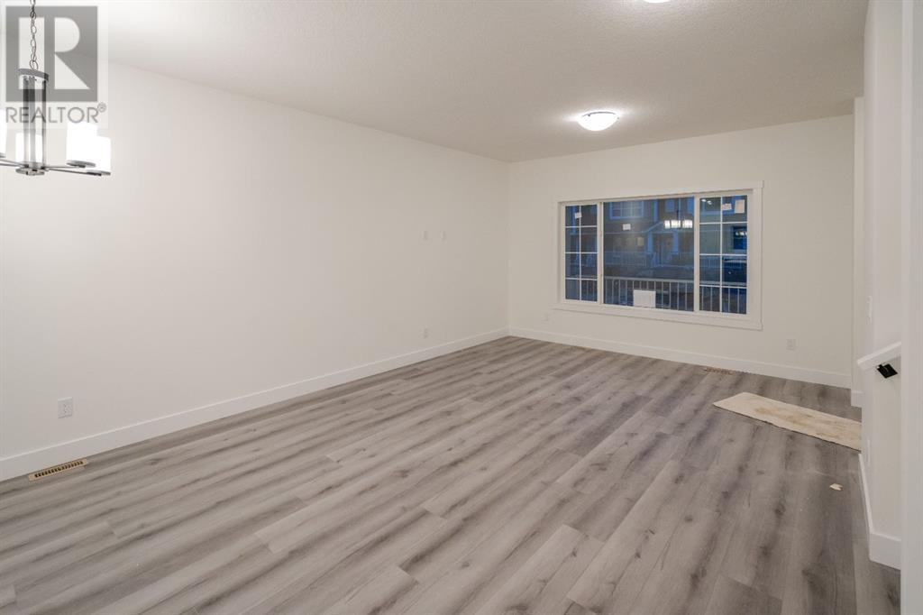 63, 59, 55, 51, 47 Baysprings Terrace Sw, Airdrie, Alberta  T4B 4a8 - Photo 7 - A2213068