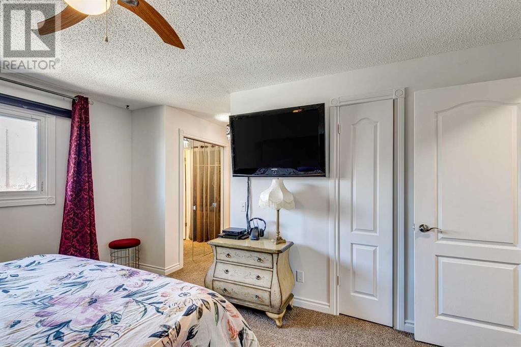 75 Beaconsfield Rise Nw, Calgary, Alberta  T3K 1X3 - Photo 12 - A2212589