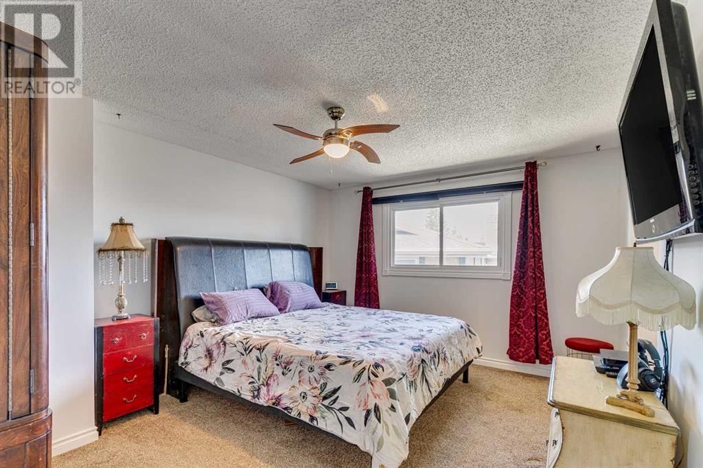 75 Beaconsfield Rise Nw, Calgary, Alberta  T3K 1X3 - Photo 11 - A2212589