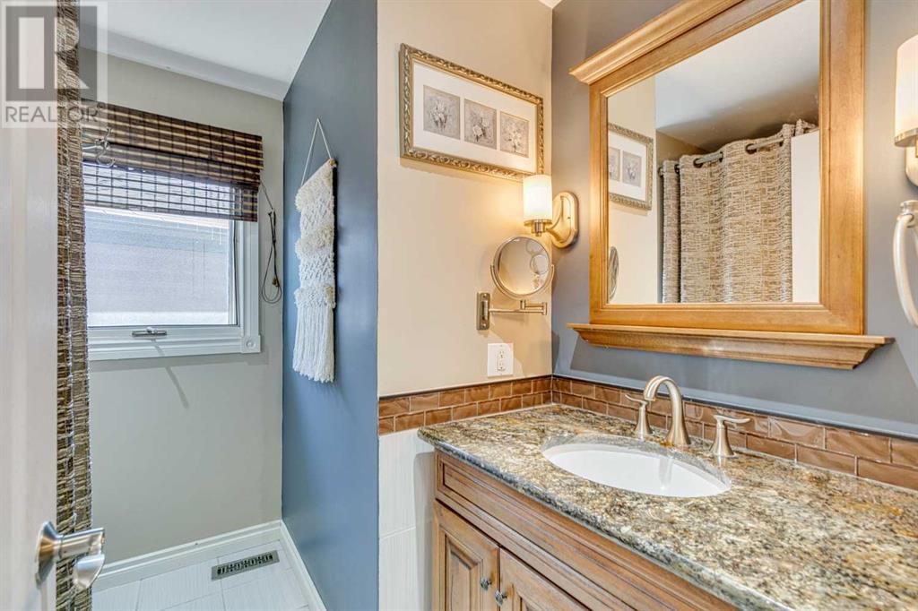75 Beaconsfield Rise Nw, Calgary, Alberta  T3K 1X3 - Photo 19 - A2212589