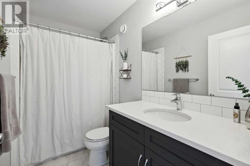 97 Kingsbury Close Se, Airdrie, Alberta  T4A 0R3 - Photo 38 - A2214198
