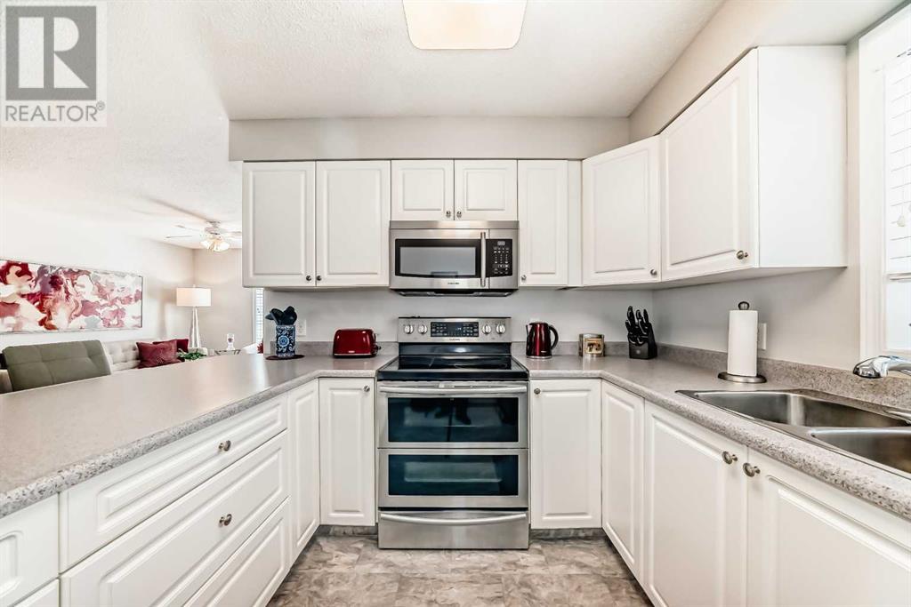 3231 Millrise Point Sw, Calgary, Alberta  T2Y 3W4 - Photo 7 - A2214245