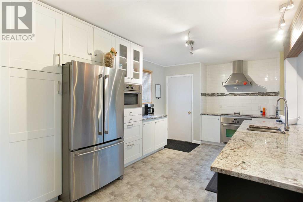 127 44 Avenue Nw, Calgary, Alberta  T2K 0J2 - Photo 9 - A2215192